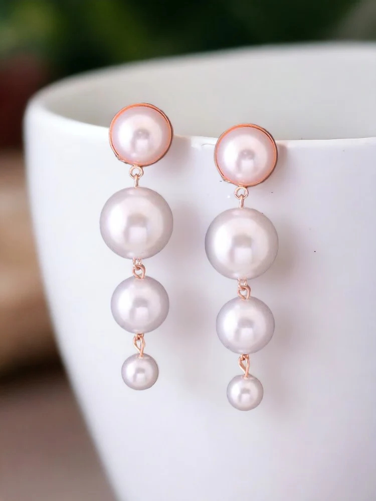 Ivory Ase Danglers
