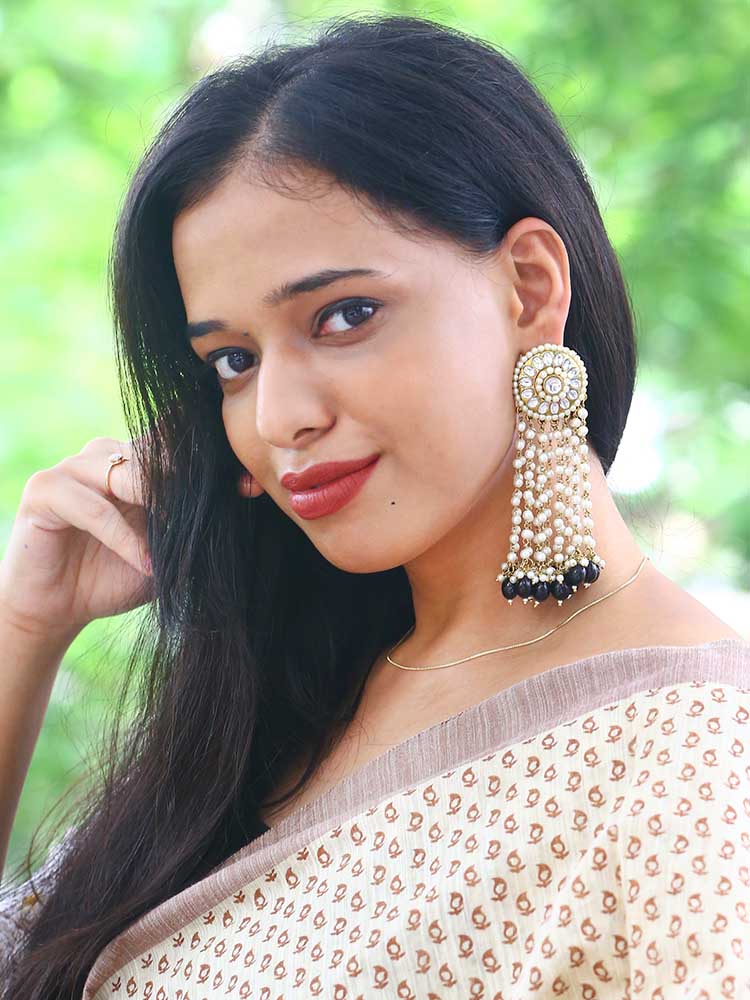 Jet Heer Tassel Earrings - Image 2